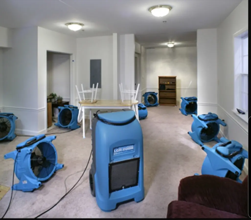 Air movers and dehumidifier setup for Water Damage Restoration in Aiea